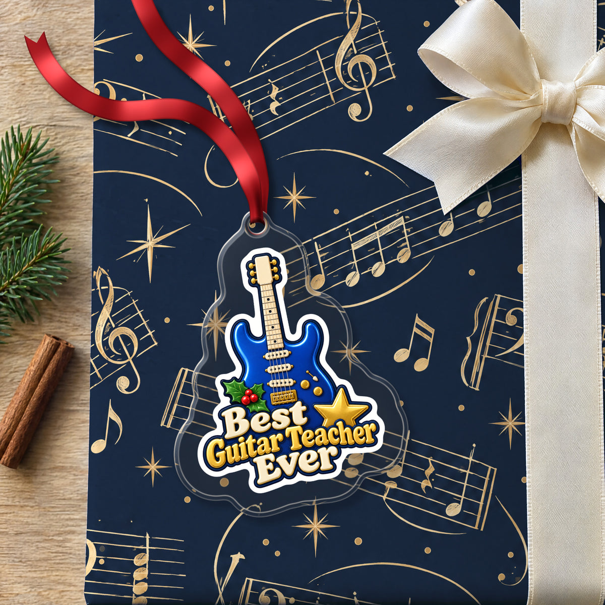 Best Guitar Teacher Ever clear acrylic Christmas ornament lying on a gift wrapped in Rhythm and Beat music wrapping paper