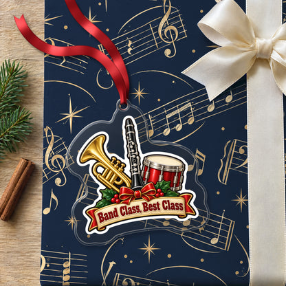 Band Class, Best Class School Band clear acrylic Christmas ornament lying on a gift wrapped in Rhythm and Beat music wrapping paper