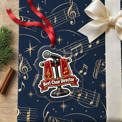 Best Choir Director clear acrylic Christmas ornament lying on a gift wrapped in Rhythm and Beat music wrapping paper