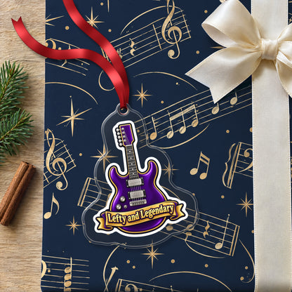 Lefty and Legendary Electric Guitar clear acrylic Christmas ornament lying on a gift wrapped in Rhythm and Beat music wrapping paper