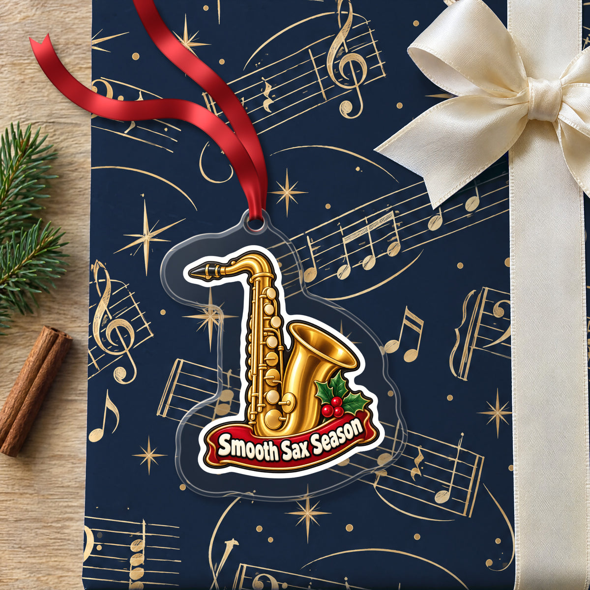 Smooth Sax Season Saxophone clear acrylic Christmas ornament lying on a gift wrapped in Rhythm and Beat music wrapping paper