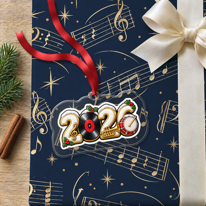 2026 Music Lover clear acrylic Christmas ornament lying on a gift wrapped in Rhythm and Beat music wrapping paper