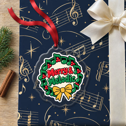Merry & Melodic Music Note Wreath clear acrylic Christmas ornament lying on a gift wrapped in Rhythm and Beat music wrapping paper
