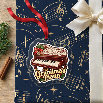 Grandma's Piano clear acrylic Christmas ornament lying on a gift wrapped in Rhythm and Beat music wrapping paper