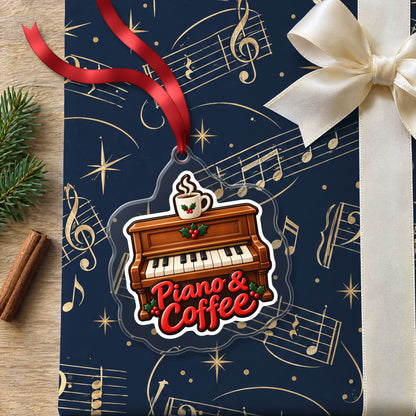 Piano & Coffee Christmas Ornament for Pianists clear acrylic Christmas ornament lying on a gift wrapped in Rhythm and Beat music wrapping paper