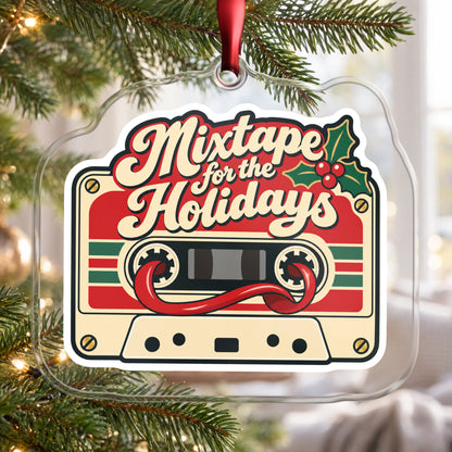 Mixtape for the Holidays Cassette clear acrylic Christmas ornament hanging on a Christmas tree by a bright window