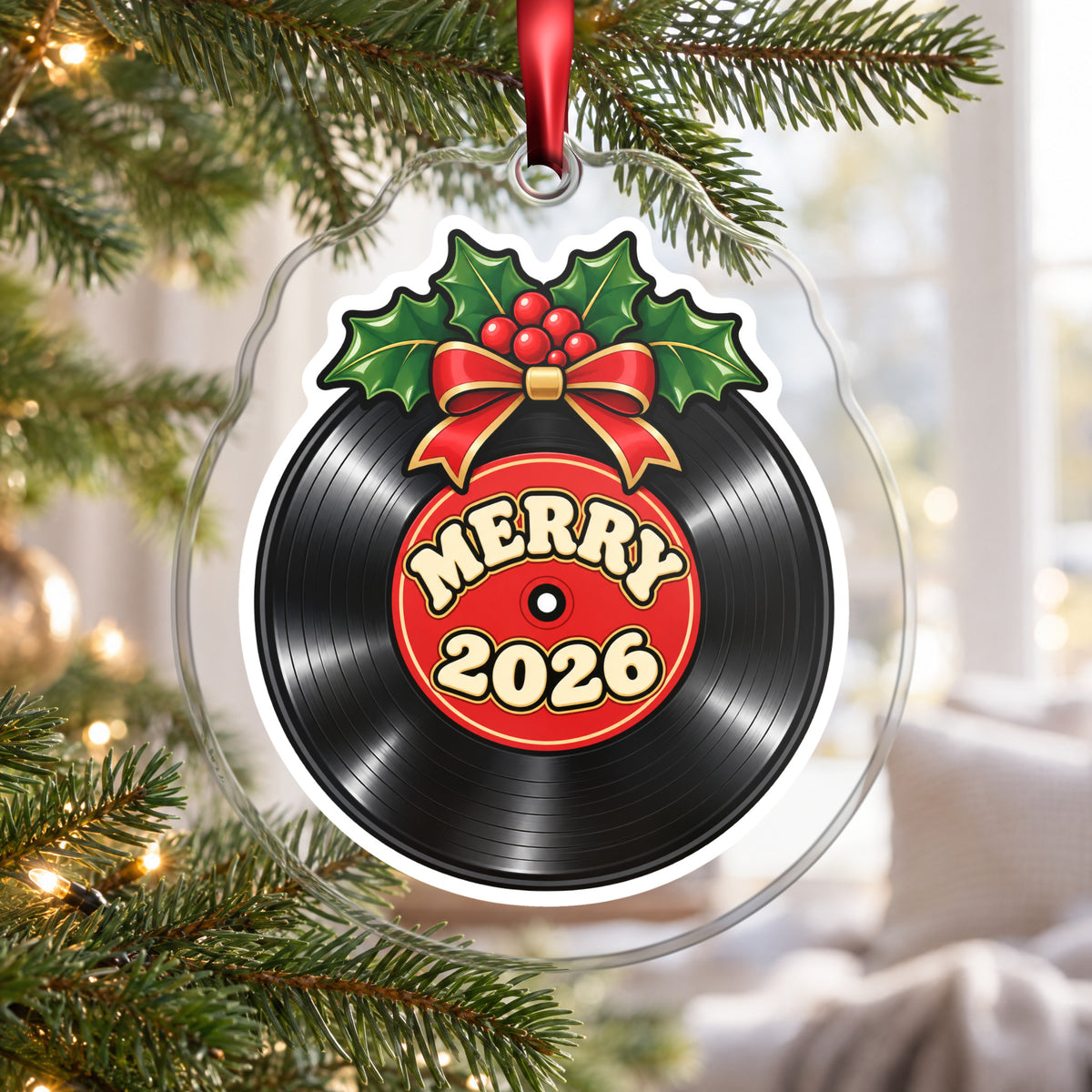 Merry 2026 Vinyl Record clear acrylic Christmas ornament hanging on a Christmas tree by a bright window