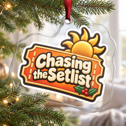 Chasing the Setlist Festival Ticket clear acrylic Christmas ornament hanging on a Christmas tree by a bright window