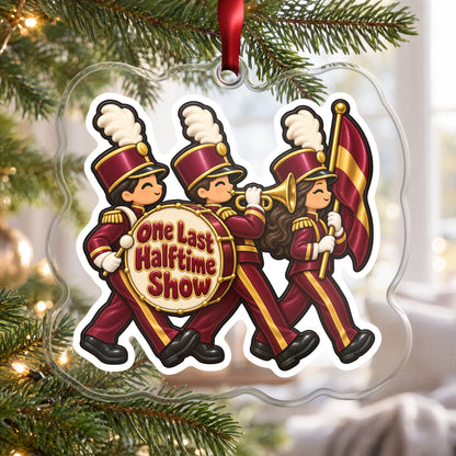 One Last Halftime Show Marching Band clear acrylic Christmas ornament hanging on a Christmas tree by a bright window