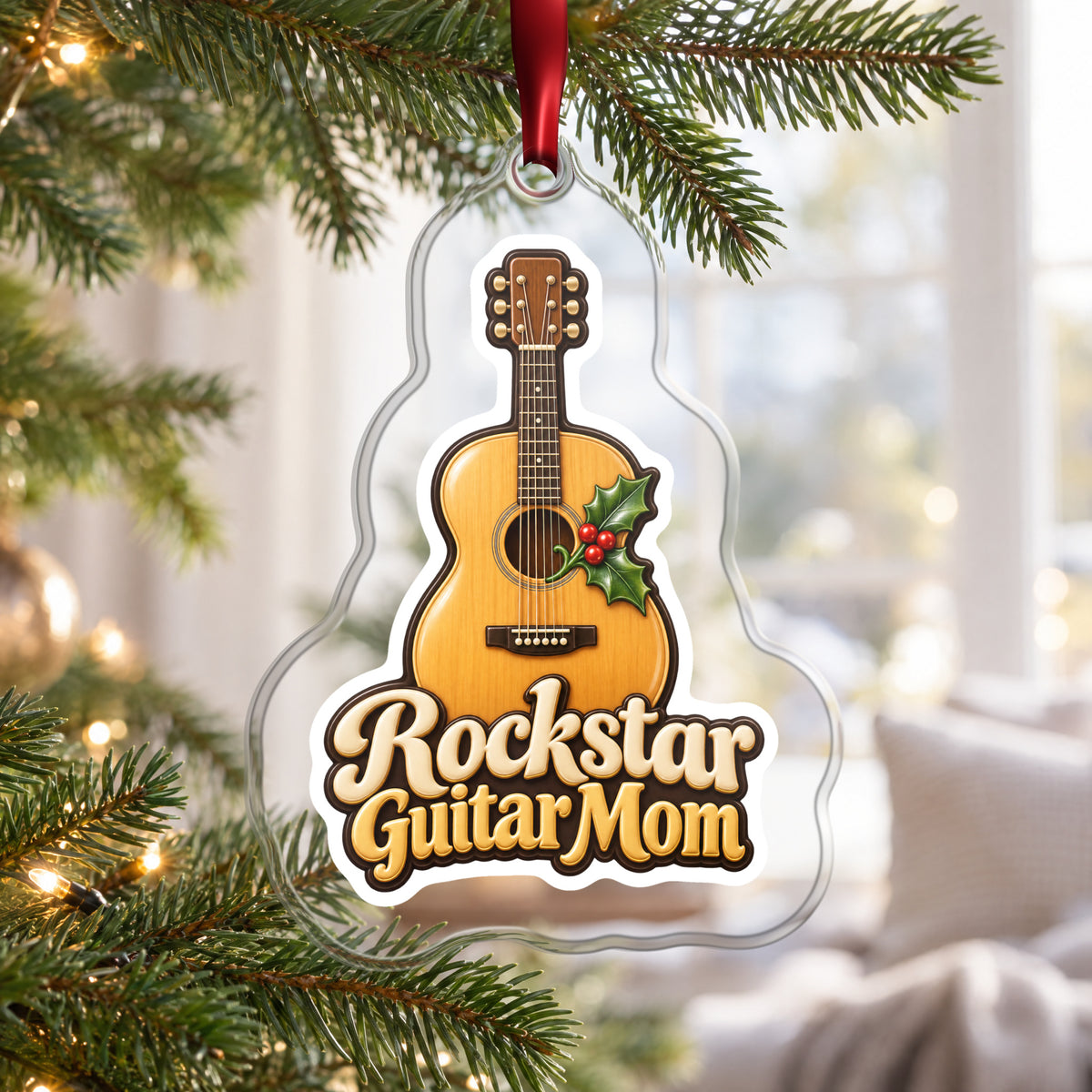 Rockstar Guitar Mom clear acrylic Christmas ornament hanging on a Christmas tree by a bright window