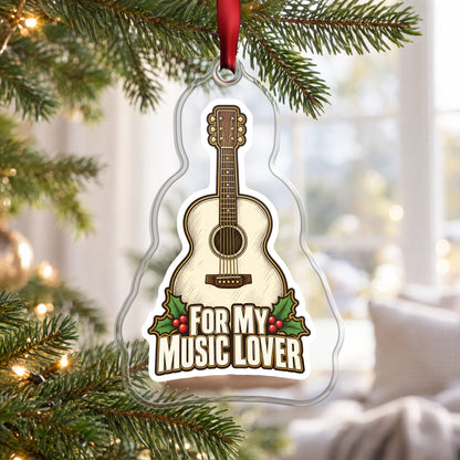 For My Music Lover Acoustic Guitar clear acrylic Christmas ornament hanging on a Christmas tree by a bright window