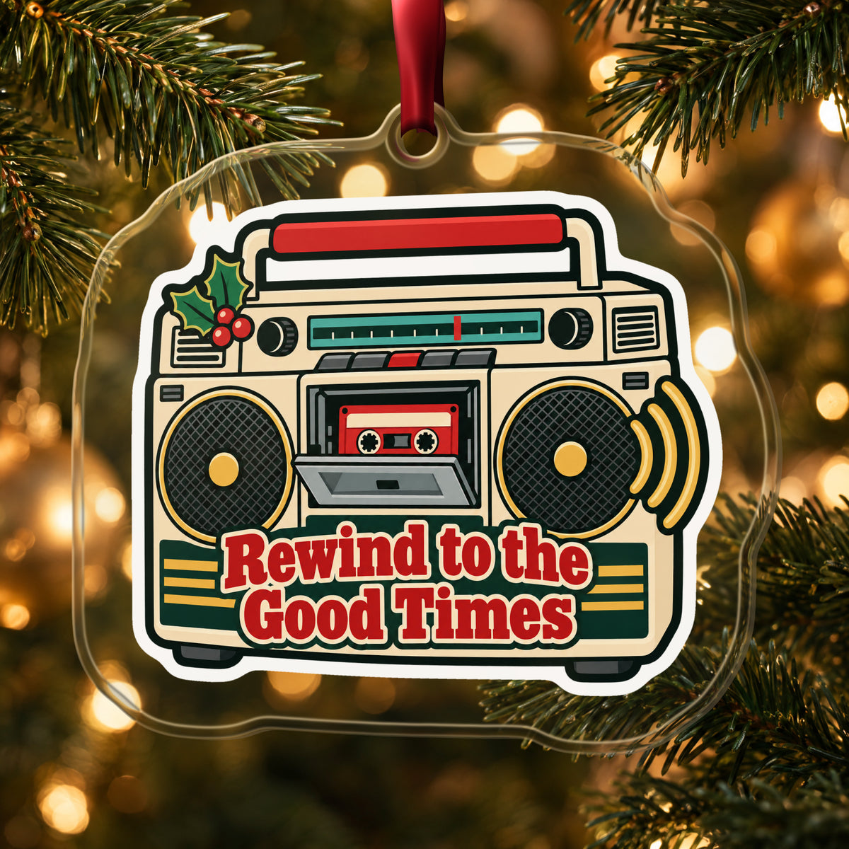 Rewind to the Good Times Boombox clear acrylic Christmas ornament hanging on a lit Christmas tree with warm gold lights