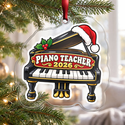 Piano Teacher 2026 clear acrylic Christmas ornament hanging on a Christmas tree by a bright window