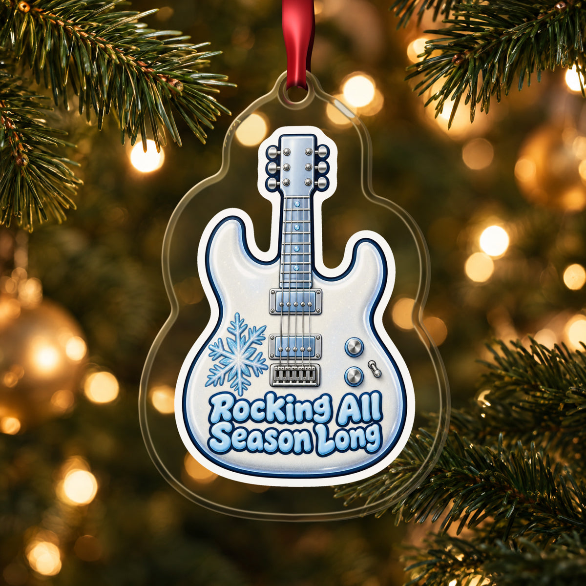 Rocking All Season Electric Guitar clear acrylic Christmas ornament hanging on a lit Christmas tree with warm gold lights