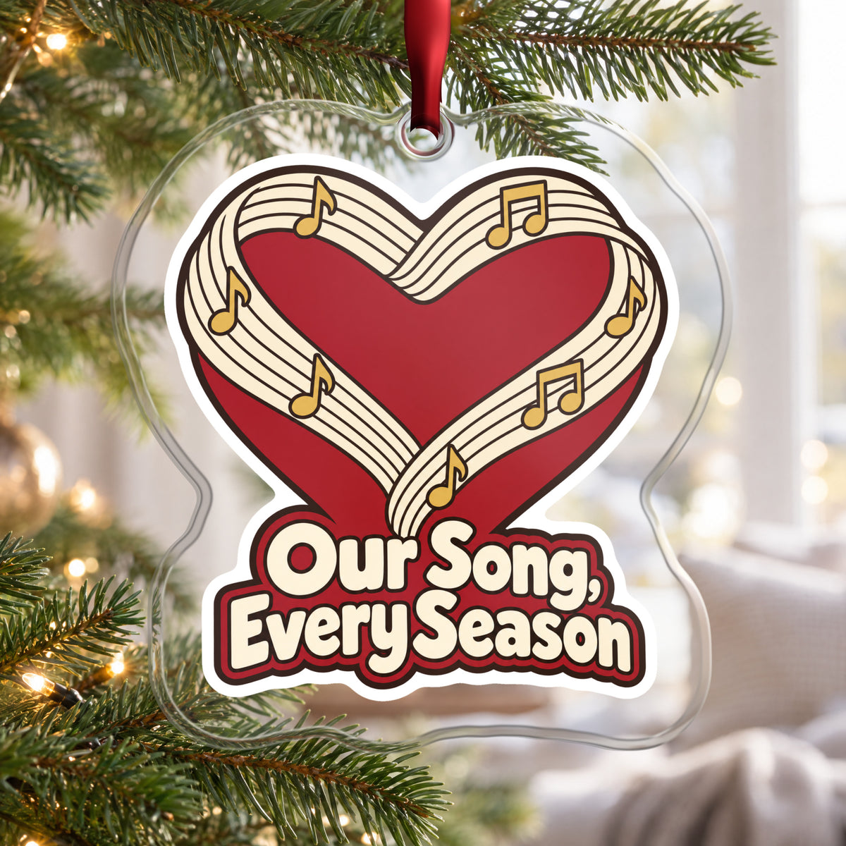 Our Song, Every Season Sheet Music Heart clear acrylic Christmas ornament hanging on a Christmas tree by a bright window
