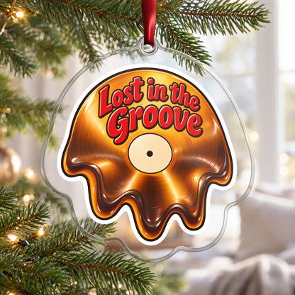 Lost in the Groove Melting Vinyl clear acrylic Christmas ornament hanging on a Christmas tree by a bright window