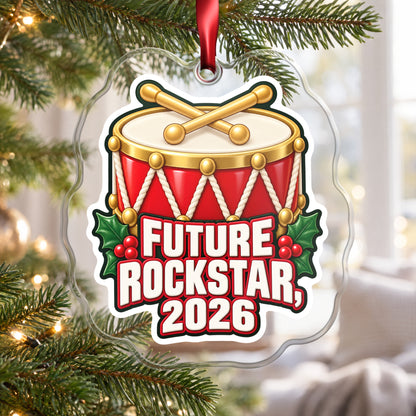 Future Rockstar 2026 Toy Drum clear acrylic Christmas ornament hanging on a Christmas tree by a bright window