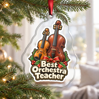 Best Orchestra Teacher clear acrylic Christmas ornament hanging on a Christmas tree by a bright window