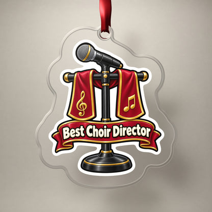 Best Choir Director clear acrylic Christmas ornament on a plain studio backdrop with its red ribbon