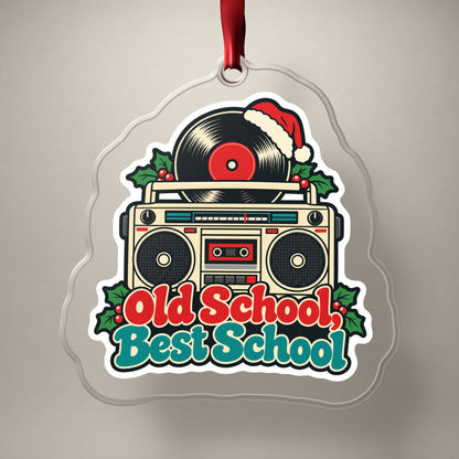 Old School, Best School Boombox clear acrylic Christmas ornament on a plain studio backdrop with its red ribbon