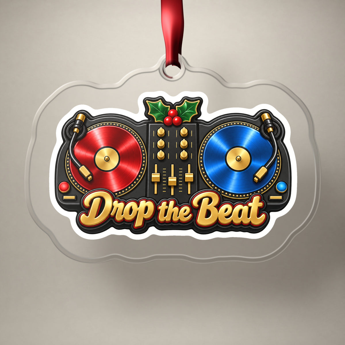 Drop the Beat DJ Turntables clear acrylic Christmas ornament on a plain studio backdrop with its red ribbon