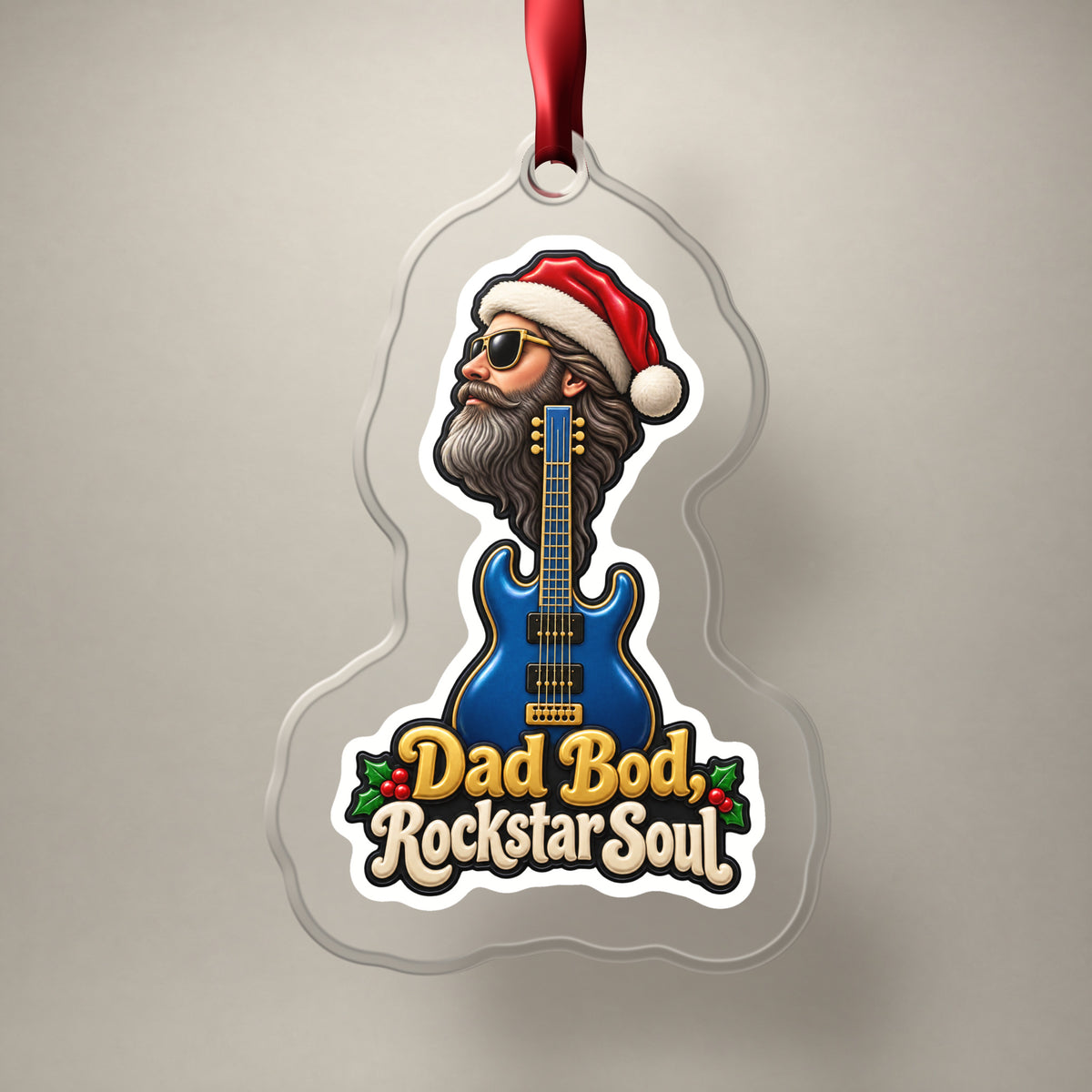 Dad Bod, Rockstar Soul Guitar clear acrylic Christmas ornament on a plain studio backdrop with its red ribbon
