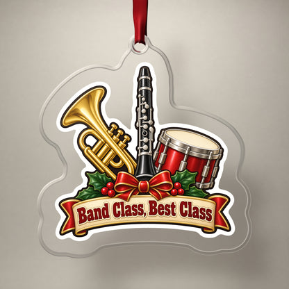 Band Class, Best Class School Band clear acrylic Christmas ornament on a plain studio backdrop with its red ribbon