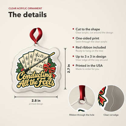 Conducting All the Feels Baton clear acrylic Christmas ornament details card: size, clear acrylic, ribbon included, printed in the USA