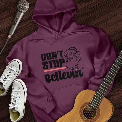 Printify Hoodie Maroon / S Don't Stop Believing Santa Hoodie
